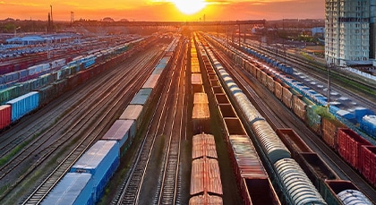 A rail yard at dusk